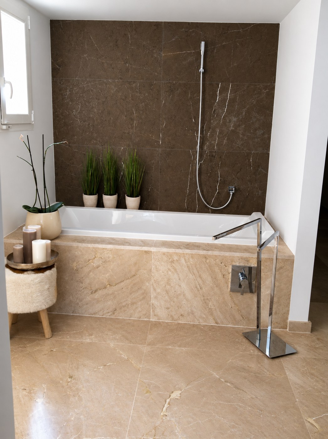 Marble bathroom renovation with bathtub and concealed taps by JSL in Mallorca