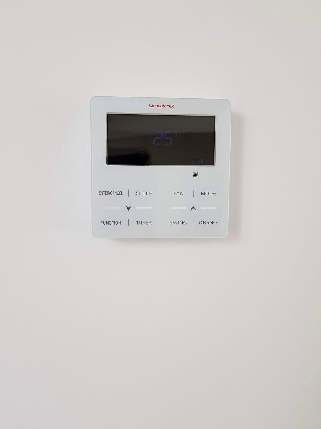 Zone-control thermostat on the wall during the Casa Llucmajor build, an installation by JSL in Mallorca